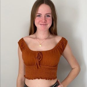 Off the shoulder burnt orange shirt